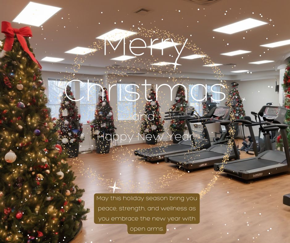 A fitness studio with holiday decorations, showing people exercising in a festive environment.