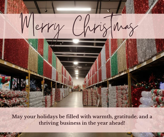 A warehouse filled with Christmas lights, decorated with holiday ornaments, and stocked with bulk items and wholesale products.