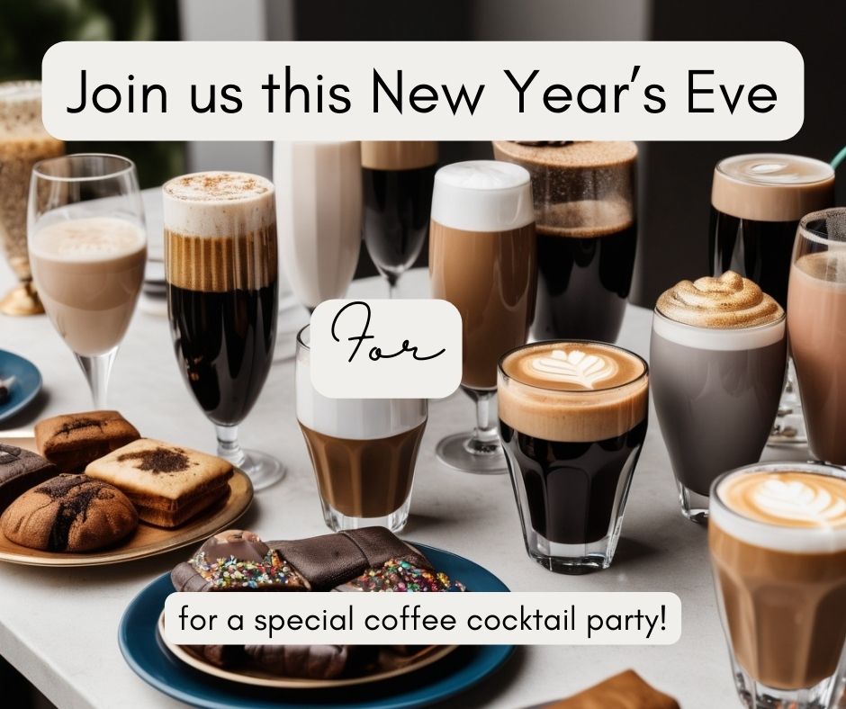 Table with various coffee drinks and sparkling glasses set for a celebration.