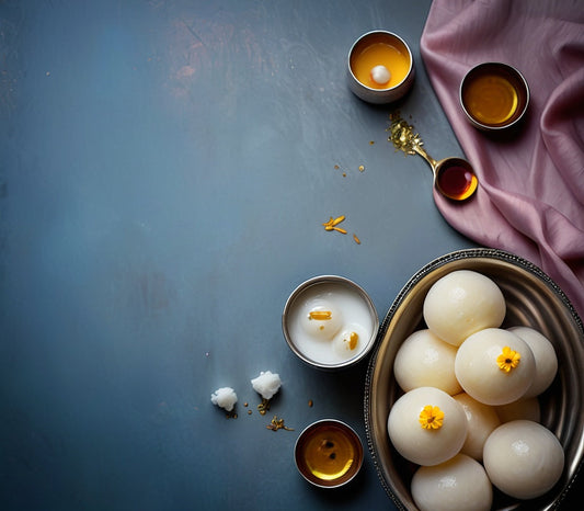 Sweet Rasgulla in Syrup with Silver Bowl