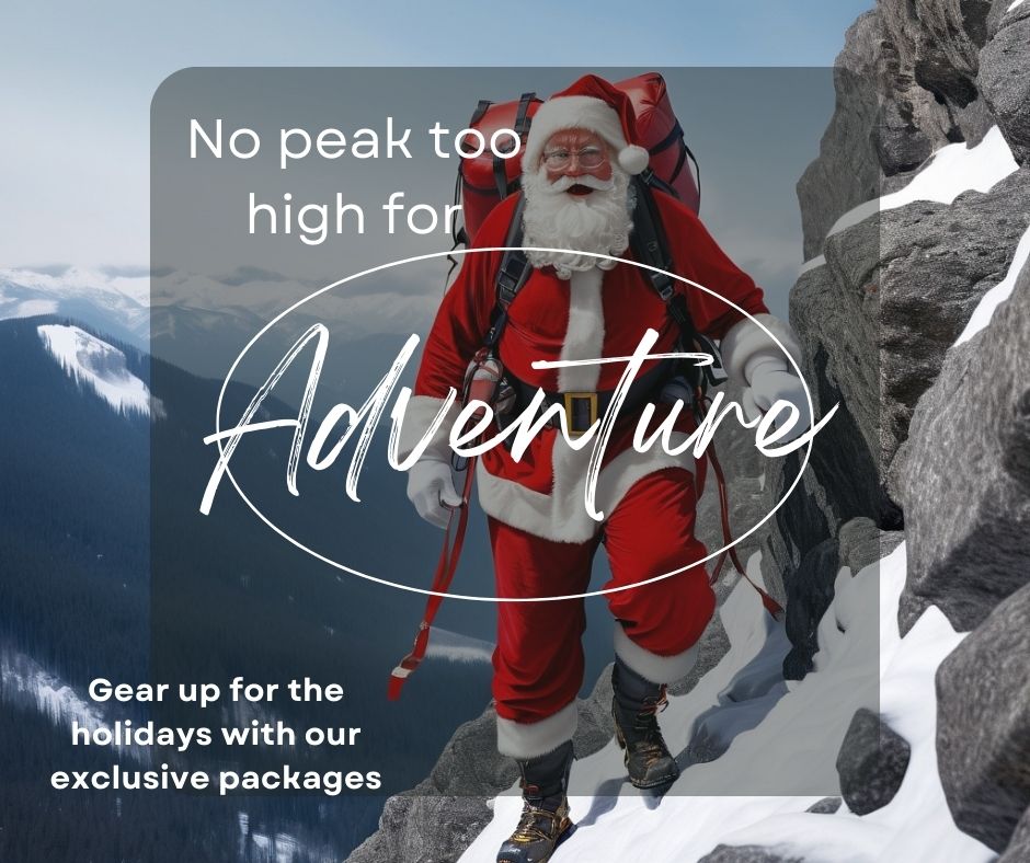 Santa Claus scaling a rocky mountain with gifts in a snowy landscape