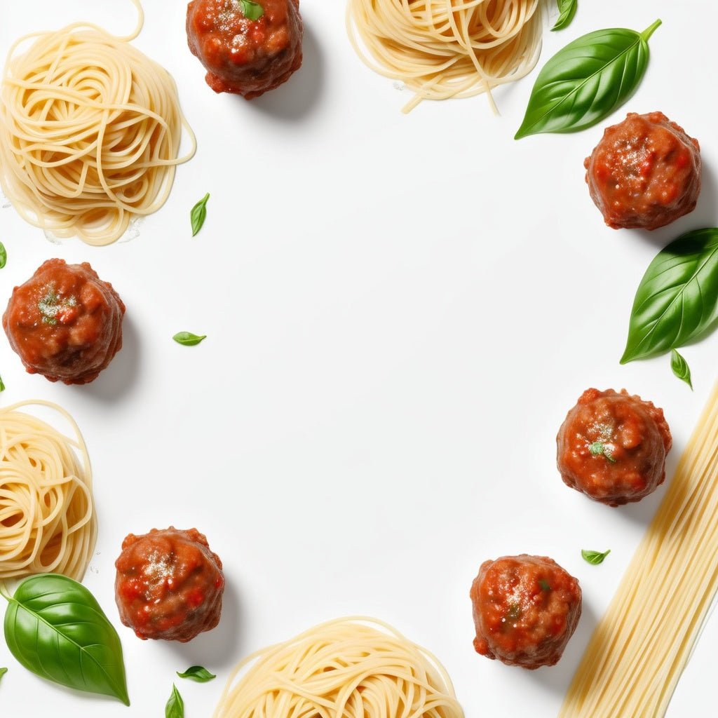 A clean white background with spaghetti, meatballs, parmesan cheese, and basil leaves scattered in the corners.